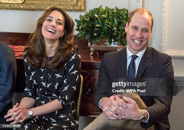 Catherine, Duchess of Cambridge and Prince William, Duke of Cambridge met with Jonny Benjamin and Neil Laybourn at Kensington Palace where they...