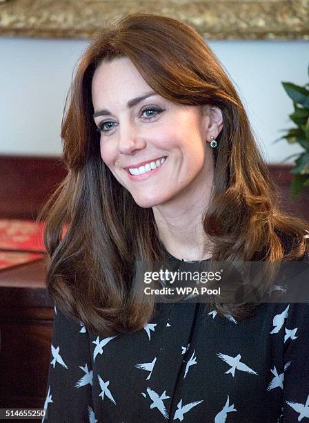 Catherine, Duchess of Cambridge along with Prince William, Duke of Cambridge met with Jonny Benjamin and Neil Laybourn at Kensington Palace when they...