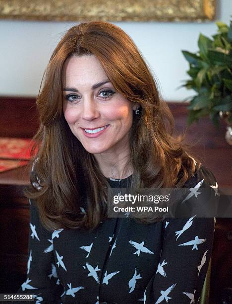 Catherine, Duchess of Cambridge along with Prince William, Duke of Cambridge met with Jonny Benjamin and Neil Laybourn at Kensington Palace when they...