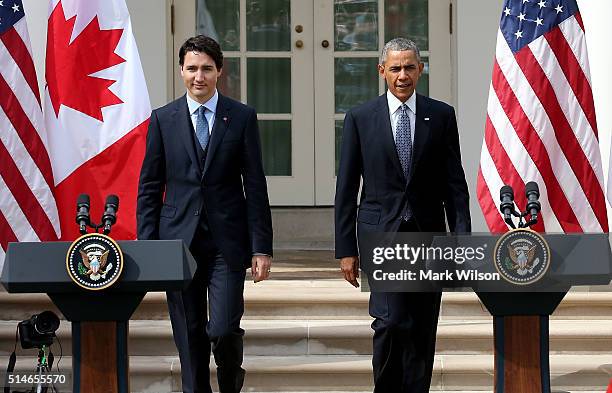 President Barack Obama and Canadian Prime Minister Justin Trudeau walk from the Oval Office to a joint press conference in the Rose Garden at the...