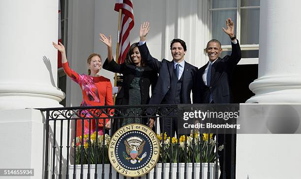 President Barack Obama, from right, Justin Trudeau, Canada's prime minister, first lady Michelle Obama, and Sophie Gregoire-Trudeau wave from a...