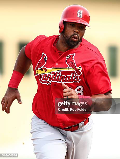 Carlos Peguero of the St. Louis Cardinals in action during the spring training game against the Miami Marlins on March 5, 2016 in Jupiter, Florida.