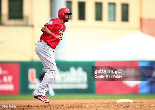 Carlos Peguero of the St. Louis Cardinals in action during the spring training game against the Miami Marlins on March 5, 2016 in Jupiter, Florida.