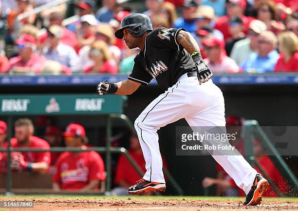 Robert Andino of the Miami Marlins in action during the spring training game against the St. Louis Cardinals on March 5, 2016 in Jupiter, Florida.