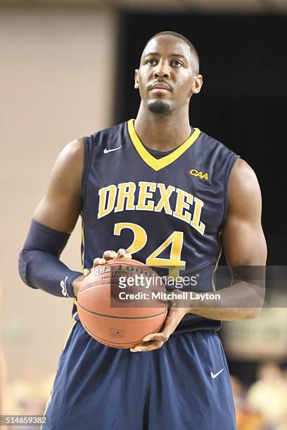 Rodney Williams of the Drexel Dragons takes a foul shot during the 1st round of the Colonial Athletic Conference Tournament college basketball game...