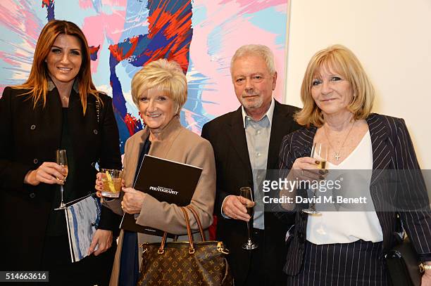 Joanne Beckham, Sandra Beckham, Tony Adams and Jackie Adams attend a charity auction of 'David Beckham: The Man' hosted by Phillips at their European...
