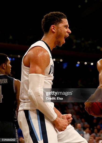 Josh Hart of the Villanova Wildcats celebrates after drawing the foul in the second half against the Georgetown Hoyas during the quarterfinals of the...