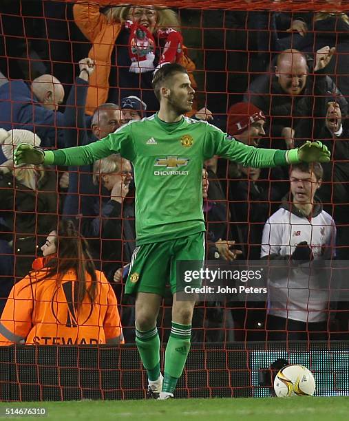 David de Gea of Manchester United reacts to conceding a goal to Roberto Firmino of Liverpool during the UEFA Europa League round of 16 first leg...