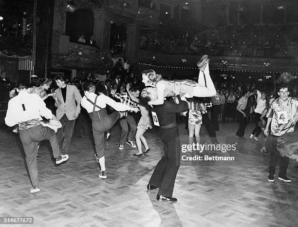 London, England: Scene during world rock'n'roll championships held at the Lyceum Ballroom. America, Denmark, Ceylon and Canada were among the nations...