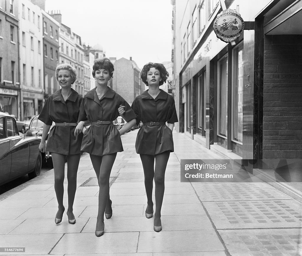 Women In Short Skirts,Tights Walk Street