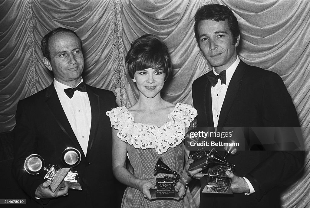 Grammy Award Winners With Trophies