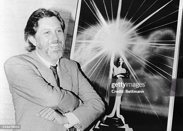 Producer David Puttnam stands with the logo from Columbia Pictures on June 26 when he was promoted to the studio's top creative post.