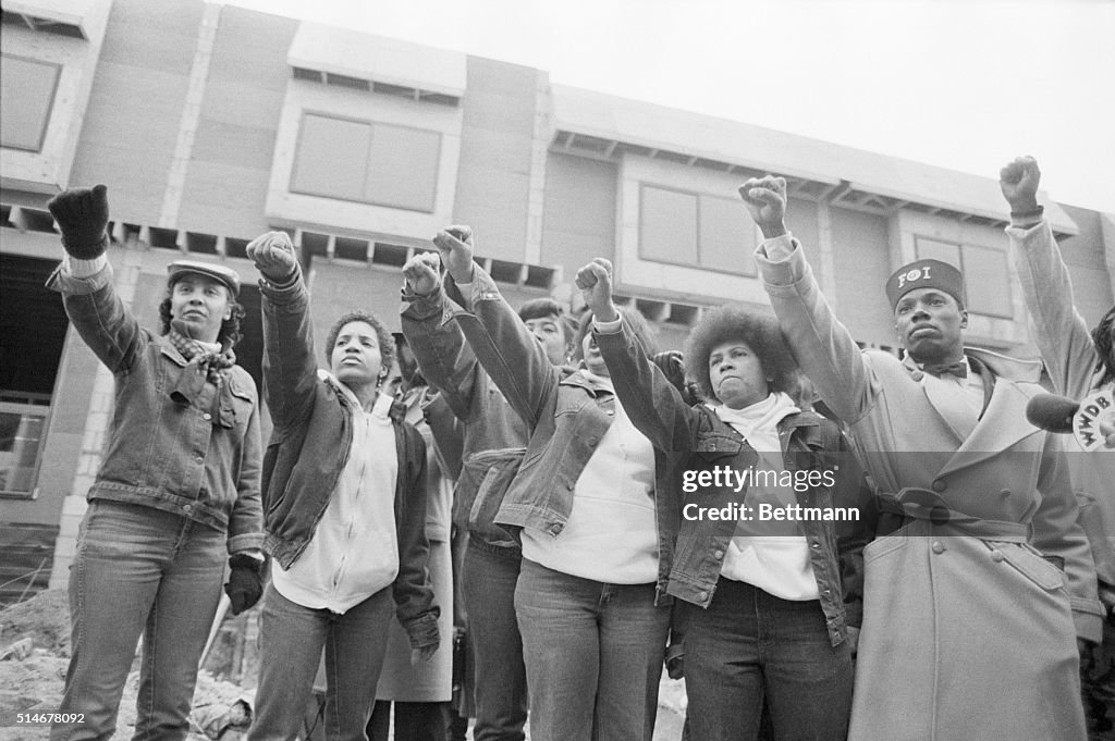 Mourners Giving Black Power Salute
