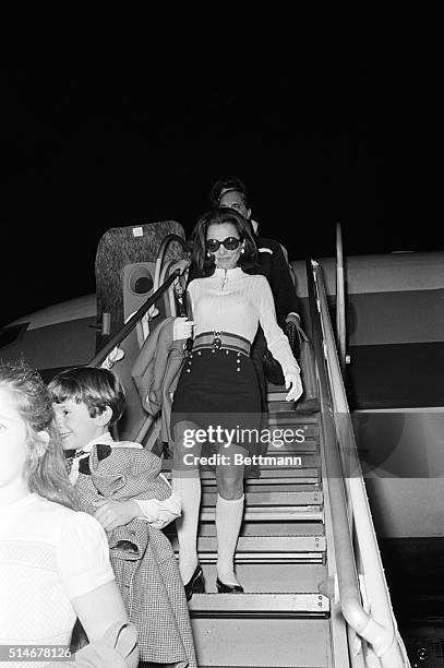 Lee Radziwill, Jackie Kennedy's sister, gets of a plane in Acapulco.