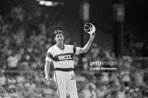 Chicago White Sox pitcher Steve Carlton tips his cap to the fans after he became the 10th pitcher in major league history to pitch 5,000 career...
