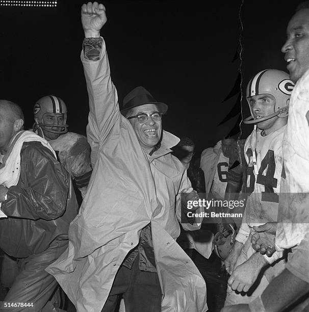 Baltimore, MD: Colts-Packers: Green Bay Packer's Coach Vince Lombardi gives a big victory yell as the final gun sounded in Memorial Stadium in...