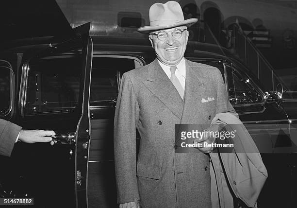 Washington, DC: Truman retruns from vacation in Florida. Tanned and rested from a five day vacation in Florida, President Truman was in high spirits...
