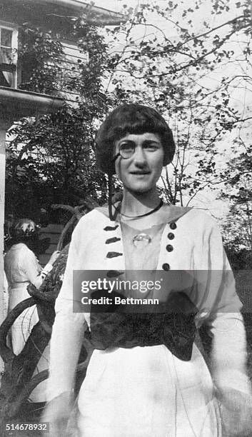 Wallis Warfield wears a monocle for a party at the Oldfields School, a prep school in Maryland. Wallis eventually married Edward VIII, leading him to...