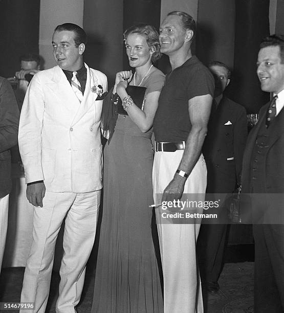 Doris Duke, heiress of the Duke tobacco fortune, attends the Burlesque Ball at the Waldorf Astoria Hotel with her husband James Cromwell and Jack...