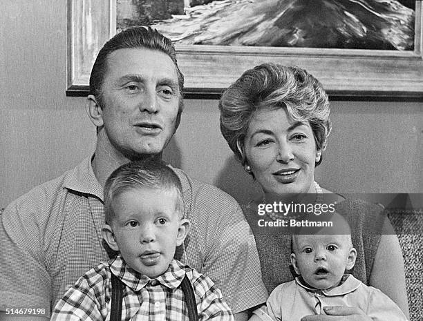 Hollywood, California: Eric Anthony Douglas, 5 months, appears pleased as he makes his camera debut here Nov. 19th with his father, actor Kirk...