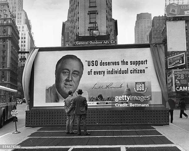 Large billboard in New York's Times Square features President Franklin Roosevelt asking Americans to support the USO.