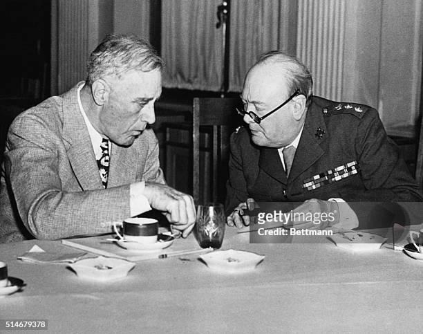 Roosevelt and Churchill talk between themselves at the Yalta Conference.