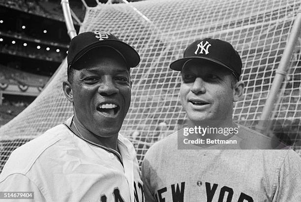 Willie Mays and Mickey Mantle stand together at the 1968 All-Star Game in Houston. Mays was captain of the National League, Mantle the American...