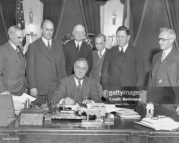 Washington D.C.: THE PRESIDENT SIGNS THE GOLD BILL."This is the nicest birthday present I ever had, "remarks Pres. Franklin D. Roosevelt as he signs...