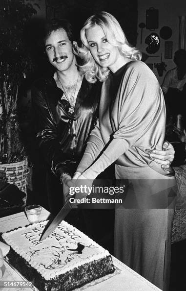 Model Dorothy Stratten and Husband Cut Birthday Cake Model Dorothy Stratten and Husband Cut Birthday Cake