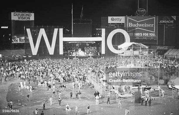 Crowd of people stand inside Shea Stadium for a concert by The Who on October 12, 1982 in New York City, New York.