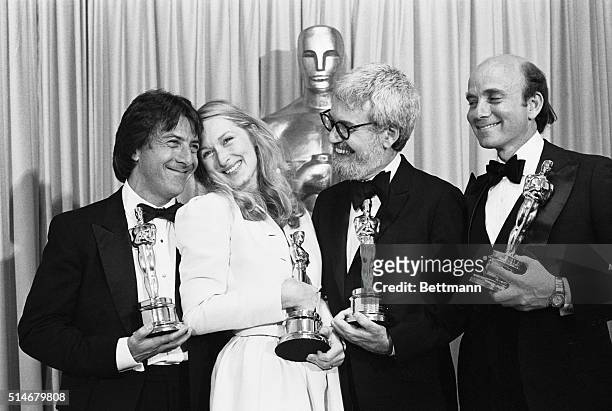 Hollywood: Actor Dustin Hoffman and actress Meryl Streep smile happily after winning their respective Oscars at the 52nd Annual Academy Awards...