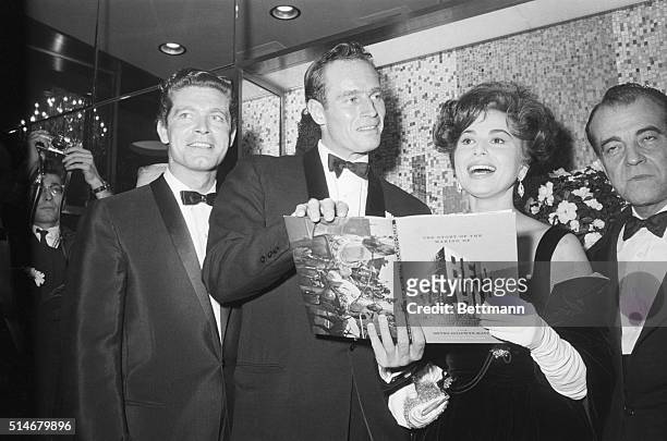 Stephen Boyd, Charleton Heston, and Haya Harareet at the opening of Ben-Hur, in which they each have starring roles. | Location: Loews State Theatre,...