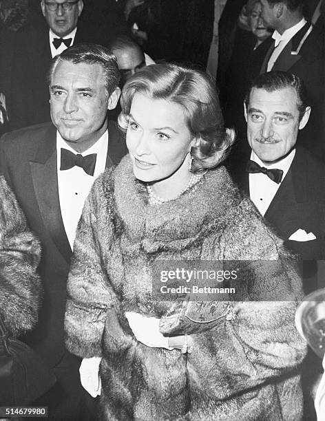 Cary Grant and Dina Merrill at the premiere of Operation Petticoat at the Leicester Square Theatre in London. | Location: Leicester Square Theatre,...