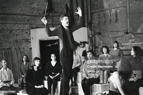 Raul Julia directs the opening chorus of women from the musical "Nine", which is derived from Federico Fellini film 8 1/2. The actress he addresses...