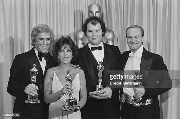 Burt Bachrach, Carole Bayer Sager, Christopher Cross, and Peter Allen collect their Oscars for the song from the movie Arthur. 1981.