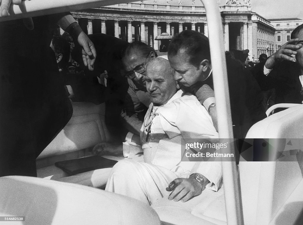 Pope Jon Paul II Assisted By Aides After Shooting