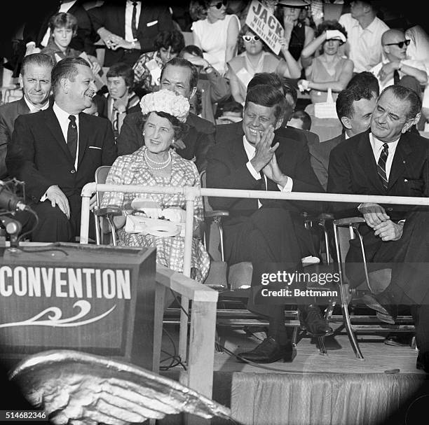 Rose Kennedy sits next to her son John and his running mate Lyndon Johnson, as the two men listen to a speech during the 1960 Democratic National...