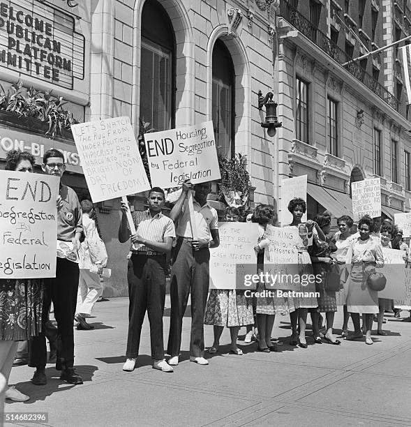 Demanding an end to housing segregation by federal legislation, demonstrators picket outside of the Sheraton-Blackstone Hotel in Chicago, where a GOP...