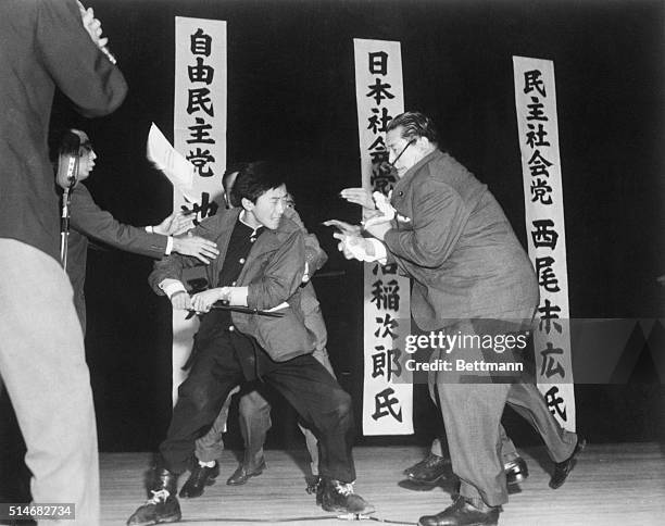 Seventeen-year-old Yamaguchi Otoya uses a foot-long sword to kill Japan Socialist Party leader Asanuma Inajiro, on a public stage in Tokyo. Yamaguchi...
