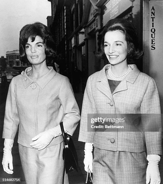 Jackie Kennedy and Princess Lee Radziwill walk through the streets of London.