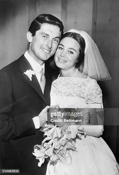 Robert Evans and Sharon Hugueny just after their wedding at his home in Beverly Hills, and just before leaving for their honeymoon.