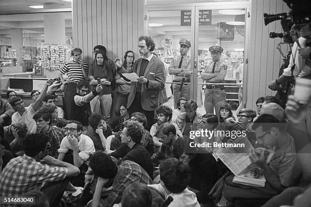 Students for a Democratic Society leader Mario Savio speaks to demonstrators at a sit-in at U.C. Berkeley.