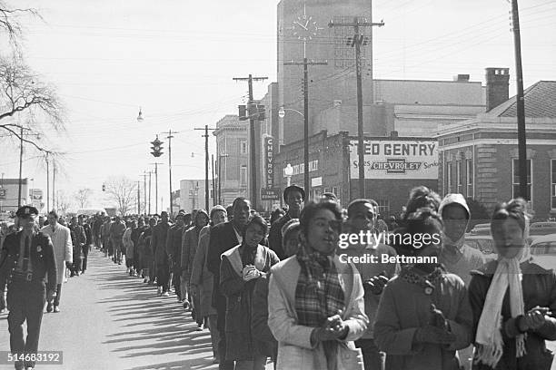 Alabama State troopers "frisk" Negro youths arrested during demonstrations here 2/4 prior to boarding them on buses. More than 130 were arrested. UPI...