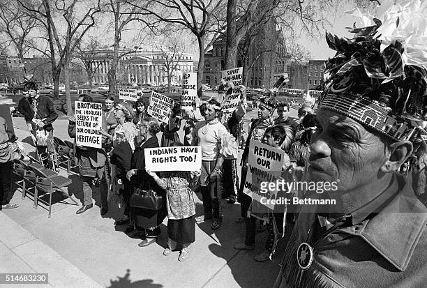 Members of various Native American tribes of New York state picket in front of the capitol building in Albany for the return of wampum belts taken by...