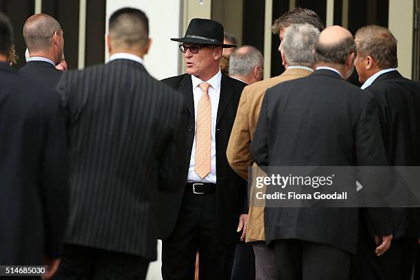 Martin Crowe's brother Jeff Crowe greets mourners as they arrive at the funeral service for Martin Crowe on March 11, 2016 in Auckland, New Zealand....