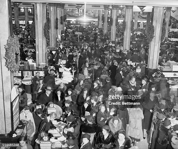 Overlooking a crowd of Christmas shoppers near the information booth at Macy's.