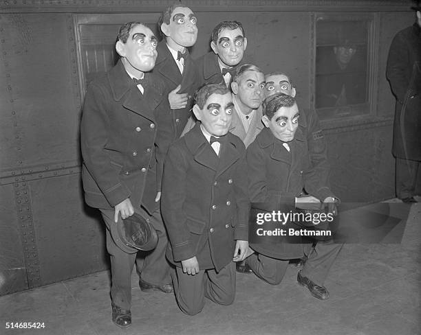 New York: Telegraph messenger boys wearing Eddie Cantor masks were at the station to meet the movie and radio comedian when he arrived at Grand...