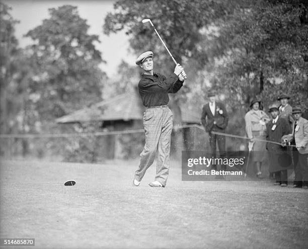 Pinehurst, North Carolina: Jimmy DeMaret, of Houston, Texas, driving from the 17th green in his match with Tony Manero, of Greensboro, N. Carolina,...