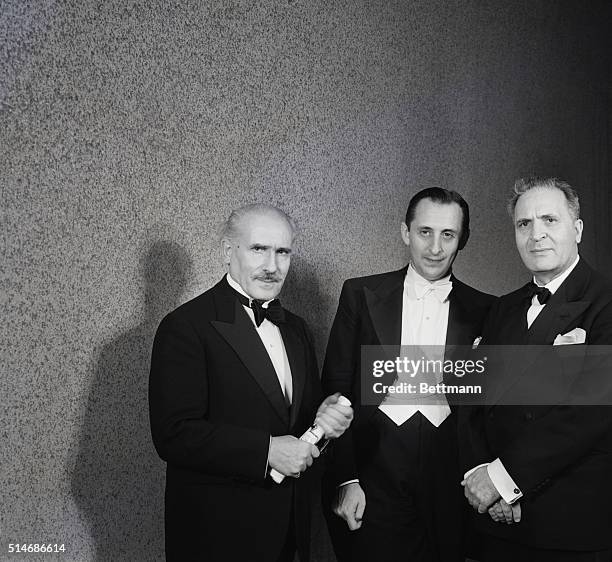 Conductor Arturo Toscanini attends his son-in-law, pianist Vladimir Horowitz's recital in Los Angeles with fellow conductor Bruno Walter.