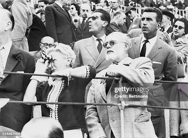 Madrid, Spain: Bearded author Ernest Hemingway and his wife Mary attend a bullfight in the Plaza De Toros Monumental here May 13. The Hemingways are...